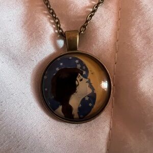 Woman’s crescent moon necklace